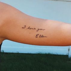 a woman's arm with the words i love you ellen written on it in cursive font