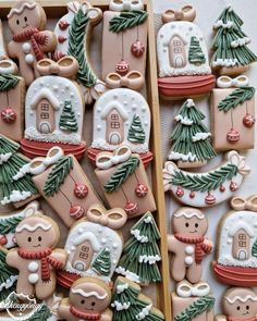 decorated cookies in the shape of houses and trees