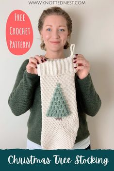 a woman holding up a christmas stocking with the text free crochet pattern