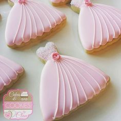 decorated cookies in the shape of dresses and tiaras