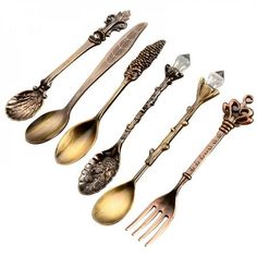 Product Description: Material:Metal Color:Gold, Silver, Copper, Cyan Size:20.7 x 8cm / 8.1" x 3.14" Package Includes: 6Pcs/Set x Spoon and Fork Notes: 1. Please allow 1-3 cm difference due to manual measurement and 3-5 g for the difference between different colors. 2. Due to the screen difference, the color may be a little difference from what you expect, please allow it. Color: Multicolor. Kitchen Spoons, Vintage Dessert, Vintage Cutlery, Dessert Fork, Vintage Spoons, Coffee Dessert, Royal Style, Spoon Fork, Antique Tea