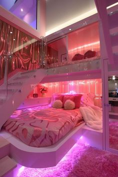 a bedroom with pink lighting and a bed in the middle of it is lit up