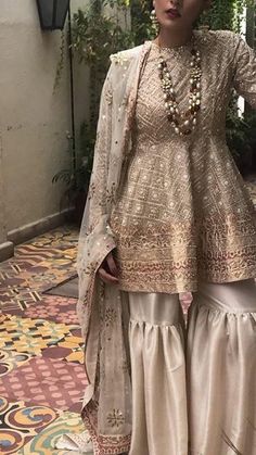 Bridel gharara set in off white color work embellished with golden dabka zari nagh naqshe and tila and pearls work.                                                                1.%100 Accurate Measurement & Fitting.(Please Ask Us Your exact measurement)2.All Dresses are Manufactured designs/Cutting/stitching Unde Nikah Bride, Bridal Gharara, Gharara Designs, Maharani Designer Boutique, Sharara Designs, Indian Fashion Trends, Super Party, Salwar Kamiz