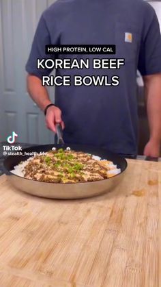 a man is cutting up food on a plate with the words korean beef rice bowls