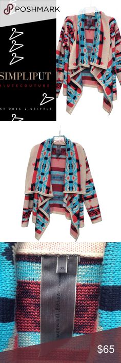 Aztec Tribal Geometric Waterfall Cardigan RN119795 Waterfall cardigan. Soft sweater knit. Hangs slightly longer in front. Cozy oversized shawl collar. Open bust and waist. Vibrant southwest tribal motif- coral red, aqua blue, navy blue, and beige. Enjoy year around. Dry clean only. Photos taken outside.  Fast ship.  No trades or off app transactions.  Kind offers welcomed. “Offer Button” only. Low ballers blocked.  ALL sales videotaped from item condition to package sealing. Please read “Meet the Posher” for more closet details before ordering. Moon Collection Sweaters Cardigans Girl Trip, Open Bust, Cardigan Oversized, Waterfall Cardigan, Moon Collection, Coral Red, Soft Sweater