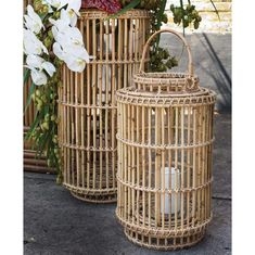 two wicker containers with flowers in them