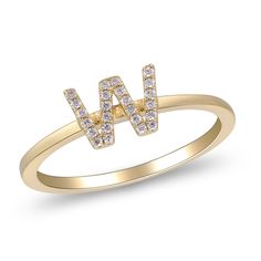 a yellow gold ring with the letter w in it's center and small diamonds on top