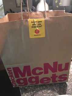 a brown paper bag sitting on top of a counter