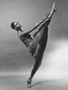 a black and white photo of a ballerina