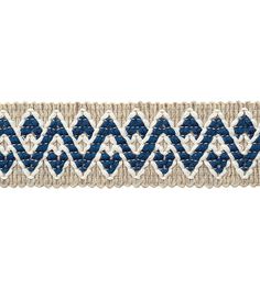 a blue and white ribbon with an intricate design