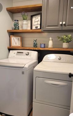 a washer and dryer in a small room