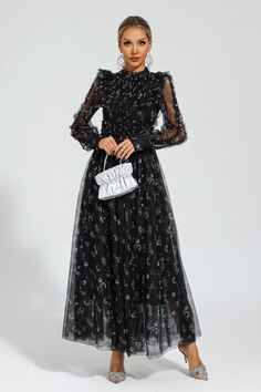 Elevate your style with the Beryl Black Floral Long Sleeve Dress. Designed with a gentle breeze of femininity, this dress features a high-waisted cut and a Peter Pan collar adorned with delicate frills. Perfect for beach getaways or birthday celebrations, this long dress exudes a graceful charm that will turn heads wherever you go.  Dress Length: Approx 140cm Materials: Polyester Gentle Dry Clean Only  The model is 5 ft 7 and wears size S  Color may vary due to lighting on images. The product im Floral Long Sleeve Dress, Beach Getaways, Long Sleeve Floral Dress, Birthday Celebrations, Pan Collar, Peter Pan Collar, Peter Pan, Birthday Celebration, Black Floral