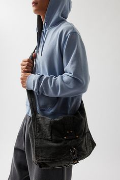 Classic look messenger bag with a flap top closure. Washed cotton bag with a secure latch closure front and rivet accents at the shoulder strap. Features Patched messenger bag Washed cotton bag Flap front Secure buckle down closure Shoulder strap Content + Care 100% Cotton Spot clean Imported | Patched Messenger Bag in Black, Men's at Urban Outfitters Casual Everyday Shoulder Bag With Button Closure, Black Cotton Shoulder Satchel, Everyday Flap Shoulder Bag With Snap Closure, Casual Shoulder Bag With Button Closure, Cotton Satchel With Pockets, Cotton Satchel With Pockets As Shoulder Bag, Cotton Shoulder Satchel With Pockets, Casual Satchel Shoulder Bag With Snap Closure, Canvas Satchel Shoulder Bag With Snap Closure