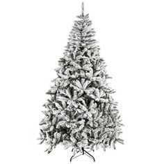 a white christmas tree with snow on it