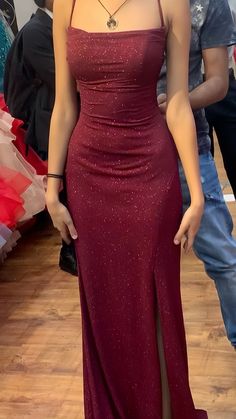 Sparkle and shine in our Glitter Burgundy Mermaid Split Senior Prom Dress! This beautiful dress features a stunning mermaid silhouette with a bold split, perfect for showing off your figure. The glittery fabric adds a touch of glamour, making this dress a standout choice for any prom or formal event. Be the talk of the night in this eye-catching dress! Dress DetailStyle: MermaidFabric: Sequin SatinColor: BurgundyLength: LongNeckline: BoatSleeves: Sleeveless Burgundy Sparkle Dress, Red Dresses Prom Long, Dark Red Prom Dress Sparkle, Dark Red Glittery Prom Dress, Elegant Long Prom Dresses, Prom Dresses Red Burgundy Sparkly, Elegance Aesthetic Outfit, Maroon Dresses Prom, Long Red Sparkly Dress