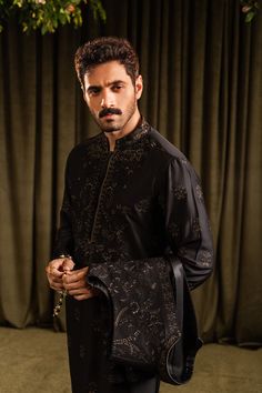 A black cotton silk kurta and pajama set with floral patterns merged with an inner border details, further accentuated with all over sequin details. 

Color: Black
Fabric: Cotton Silk Look Up Quotes, Hotel Bedroom