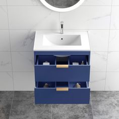 a bathroom with a sink and blue drawers