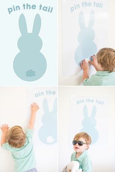 there is a little boy that is playing with the bunny wall decals on the wall