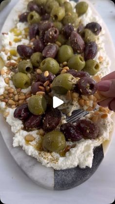 Alia & Radwa Elkaffas on Instagram: "🫒This easy OLIVE FETA BOARD is one of our favs to bring to any get together! It’s a mix of sweet and savory flavors that’s an absolute showstopper. 🌿🎉

We start with a creamy whipped feta spread, then top it with tangy marinated olives and crunchy pine nuts. Grab some pita, crackers, or your favorite veggies. 

Comment FETA RECIPE below and we’ll DM you the full recipe with instructions!

#feta #summer #appetizers #olives #mediterranean #fooddolls"