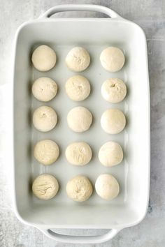 doughnuts in a baking dish ready to be baked