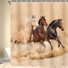 three horses running in the sand shower curtain