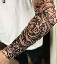 a man with a tattoo on his arm