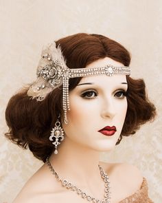 "1920s Great Gatsby Headband with blush feathers and silver crystal brooch. Stunning Great Gatsby inspired flapper headband made with curled feathers and a stunning Art Deco inspired crystal brooch. This headpiece is perfect for your 1920's themed wedding party! The rhinestone trim is 14\" long and has elastic band in the back. BLUSH color is out of stock. ♥ HOW TO ORDER: please select items that you want to buy from the drop-down menu. To purchase multiple items and please add each item to cart Vintage Feather Headpieces For Vintage Events, Vintage Feathered Headpieces For Vintage Events, Silver Gatsby Style Wedding Headpieces, Adjustable Art Deco Wedding Headpieces, Vintage Feathered Headpieces For Wedding, Vintage Wedding Headpieces With Feathers, Adjustable Feather Jewelry For Weddings, Flapper Wedding Headpiece With Feathers, Silver Gatsby Jewelry For Vintage Events