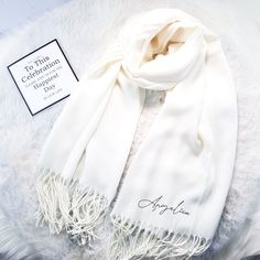 Personalized Shawl Pashmina with Signature embroidery , you can customize name or wording. 🎉This product is for Wedding favors for guests, wedding gifts, and special gifts for a special person. You can also add your personalized texts or name, font styles, and colors. Our shop specializes in embroidery therefore, customers can be confident that the products will be beautiful🎉 ѧѦ ѧHOW TO ORDER: 1)  Pick the color of the products. 2)  Pick the Fonts color. Also, If you would like to see the mockup, please contact me message box :)      🎁Specifications of the product: -It can be washed (Non-Discoloration) -Soft fabric. -Dimension: 78.74X27.55 inch. -Weights: 230 grams 📌If you have any questions, please contact me by message box :) We're looking forward to delivering these very special ite Gifts For Bridesmaids, Wedding Favors For Guests, Message Box, Personalized Embroidered, Font Styles, Our Wedding Day, Special Person, Wedding Favours, Winter Scarf