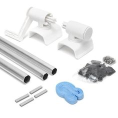 an assortment of tools and materials to make a diy project with plastic pipe holders