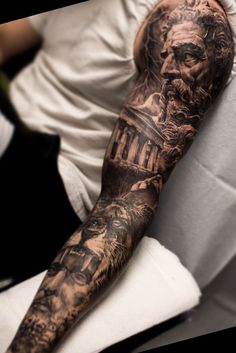 a man with a tattoo on his arm