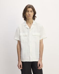 Meet the Linen Short-Sleeve Camp Shirt. This piece features a relaxed fit, short sleeves, camp collar, button closure, and patch pockets with flaps, in linen. Spring Linen Camp Shirt With Relaxed Fit, Summer Linen Camp Shirt With Pockets, Spring Linen Relaxed Fit Camp Shirt, Linen Camp Shirt With Spread Collar, White Linen Camp Shirt With Pockets, Linen Camp Collar Tops For Vacation, Linen Camp Shirt With Pockets For Beach, Beach Linen Camp Shirt With Pockets, Linen Top With Camp Collar For Vacation