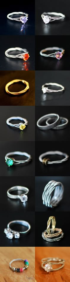 several different types of rings sitting on top of a wooden table