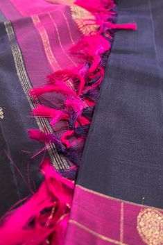 This classic kanjivaram saree in deep purple shot with balck is handwoven with paisely motifs in gold zari, on the body. The borders in magenta pink shot with black have checks in gold zari enclosed with yazhi and chakra motifs, while the grand pallu features traditional motifs in gold zari. The blouse piece is in magenta pink shot with black color. Approximate Length 6.5 mtrs (inclusive of blouse length) Height - 46 - 52" Approximate weight - 1.6 lbs Saree comes with fall, picot and tassels done. Blouse piece is cut. Kindly Note : The colors you see on your device may vary due to the color reproduction, brightness and resolution of individual devices. If you'd like more clarity before your purchase, please contact our support team. *** Readymade blouse shown is for styling purposes only a Kanjivaram Sarees, Silk Cotton Sarees, Readymade Blouse, Blouse Length, Blouse Piece, Cotton Saree, Deep Purple, Black Color, Silk Sarees