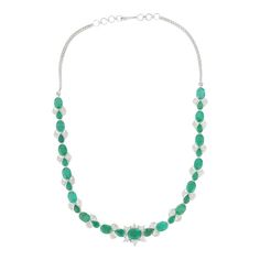 This is part of Chairish’s Fine Jewelry assortment.  Emerald Necklace in 18K Gold studded with oval and pear cut emerald pieces and diamonds. Accessorize your look with this elegant emerald beaded necklace. This stunning piece of jewelry instantly elevates a casual look or dressy outfit. Comfortable and easy to wear, it is just as exquisite worn alone or layered with other charms for a modern fashion statement.  PRODUCT DETAILS :-  > Material - 18K white Gold  > Gemstone - Emerald  > Gemstone We Formal Emerald Necklaces With Single Cut Diamonds, Formal Emerald Necklace With Single Cut Diamonds, Luxury Oval Emerald Necklace, Hand Set Emerald Necklace In Fine Jewelry Style, Hand-set Emerald Necklace In Fine Jewelry Style, Hand Set Emerald Necklace, Outfit Comfortable, Dressy Outfit, Diamond Choker Necklace