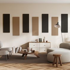 a living room filled with furniture next to a wall mounted art piece on the wall