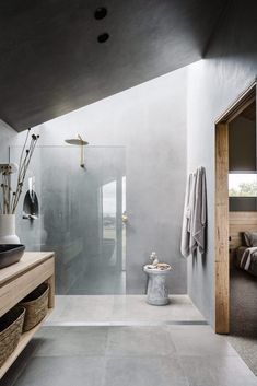 an instagramted photo of a bathroom with grey walls