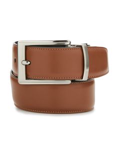 The Perry Ellis tan leather belt offers a blend of style, durability and sophistication. Crafted from high-quality tan leather, this premium men's belt gives any outfit a smart finishing touch, making it an essential accessory for your wardrobe. The versatile tan shade complements a range of both casual and formal looks for versatile wear while the precision stitching and polished buckle provide a refined finish that elevates your look. 100% Leather Regular Fit Polished Belt Buckle Tan Finish Fo Classic Brown Belt For Business Casual, Luxury Brown Belts And Suspenders For Business, Classic Brown Belts For Business Casual, Modern Brown Belt Buckles For Business, Modern Brown Belt Buckle For Business, Classic Brown Belt Buckles For Business, Formal Brown Belts, Brown Leather Belt Buckle For Business, Brown Leather Belt Buckles For Business