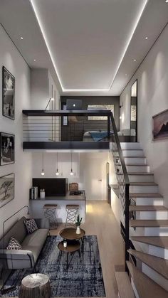 a modern living room with stairs leading up to the second floor