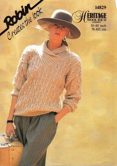 a woman in a hat and sweater is holding a suitcase while standing on the cover of a magazine