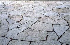 an image of a stone floor that looks like it is cracked