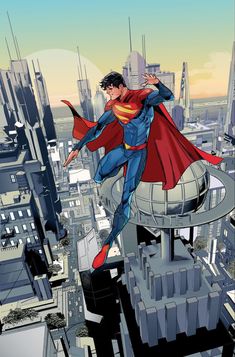 a man flying through the air while wearing a superman suit on top of a building