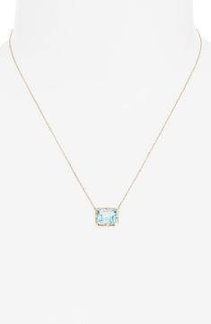 An emerald-cut topaz in a dreamy blue hue beams at the heart of this 14-karat gold pendant necklace that adds an elegant pop of color to your neckline. 3/8"W x 1/4"L pendant 14k-gold/blue topaz Made in Canada Blue Topaz Necklace Simple, Luxury Blue Square Pendant Necklace, Blue Rectangular Pendant Fine Jewelry, Blue Emerald Cut Necklace Fine Jewelry, Blue Emerald Cut Fine Jewelry Necklace, Elegant Blue Topaz Faceted Necklaces, Elegant Blue Topaz Faceted Necklace, Blue Baguette Cut Necklaces For Gifts, Luxury Blue Topaz Jewelry Radiant Cut