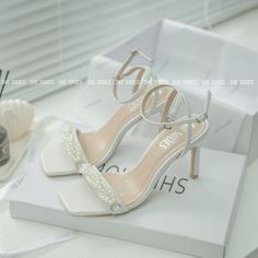 Product description: - Name & type: Pointed heel wedding sandals with twisted pearls for the bride. - Heel height: 8 cm. - Material: High-quality PU leather. - High-quality elastic TPR sole material, noise reduction armor. Especially good adhesion, non-slip. - Decoration: Pearl - Color: White. - Occasion: Wedding, party, office, going out... * Note: Size according to the attached image (For the wedge sole form, increase 1 size because the size is smaller than normal). * Warranty and size exchang Pearl Wedding Shoes, Designer Wedding Shoes, Pearl Necklace Wedding, Toe Shoes, Pointed Heels, Wedding Sandals, Wedding Dress Accessories, Bride Shoes, Pearl Wedding