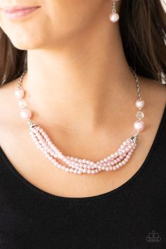 Oversized pink pearls and crystal-like beads give way to layers of beaded pearl strands below the collar for a timeless look. Features an adjustable clasp closure.

 Sold as one individual necklace. Includes one pair of matching earrings. Paparazzi Jewelry Images, Anting Manik, Paparazzi Accessories Jewelry, Pink Pearl Necklace, Pink Pearls, Bling Necklace, Pink Necklace, Paparazzi Accessories, Pearl Strands