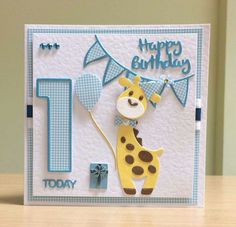 a happy birthday card with a giraffe holding a blue flag and number one