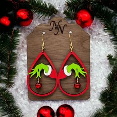 SIZE: Small: 1.75 inches long. 2.35 inches long with the hook.  Large: 2 inches long. 2.6 inches long with the hook.  Extra Large: 2.25 inches long. 2.85 with the hook.  Please note. The red jingle bell does have a slight jingle to it.  MATERIALS: Maple wood. Acrylic paint. Very lightweight. Sealed with acrylic paint sealer. they are not double sided. The back is painted red.  Ear wires are hypoallergenic surgical stainless steel French hooks. This is a high quality metal that is durable and tar Hand Painted Earrings Wood, Ornament Earrings, Vero Beach Fl, Earrings Wood, Hand Painted Earrings, Long Holiday, Painted Earrings, Wood Acrylic, Vero Beach