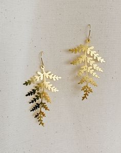 Fern Leaf Brass Earrings Length: 5,7 cm Gold plated brass hooks Gold Leaf Botanical Jewelry, Botanical Style Gold Leaf Jewelry, Botanical Leaf Shaped Gold Jewelry, Leaf-shaped Brass Earrings With Ear Wire, Nature-inspired Gold Leaf Earrings, Gold Leaf Nature-inspired Earrings, Gold Botanical Dangle Earrings, Nature-inspired Gold Nickel-free Earrings, Botanical Leaf-shaped Earrings With Ear Wire