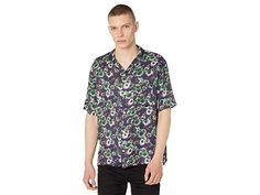 AllSaints Florax Short Sleeve Shirt - Men's Clothing : Jet Black : Who said florals are just for girls? Just look at the AllSaints Florax Short Sleeve Shirt featuring blurred floral pattern. Regular fit Hawaiian shirt. Camp collar and short sleeves. Buttoned front closure and single left chest pocket. Allover blurred floral print. Straight hem. 100% EcoVero viscose. Machine wash, line dry. Imported. Measurements: Length: 29 in Product measurements were taken using size MD. Please note that measu Spring Green Camp Shirt With Floral Print, Spring Collared Printed T-shirt, Green Floral Print Camp Shirt For Spring, Spring Patterned Short Sleeve T-shirt, Patterned Camp Shirt With Floral Print And Relaxed Fit, Patterned Floral Print Camp Shirt With Relaxed Fit, Green Short Sleeve Camp Shirt For Spring, Patterned Casual Short Sleeve Shirt Relaxed Fit, Casual Patterned Camp Shirt For Spring