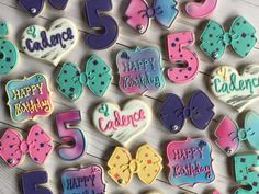 decorated cookies are arranged in the shape of numbers