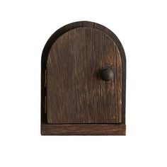 a wooden door with a metal knob on it